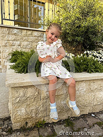 Cutie girl posing in the city daytime Stock Photo