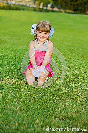 Cutie on the grass Stock Photo