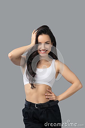 Pretty brunette girl in balck pants posing Stock Photo