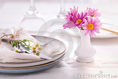 Cutlery with napkin and flower decoration - fine dining and place setting Stock Photo
