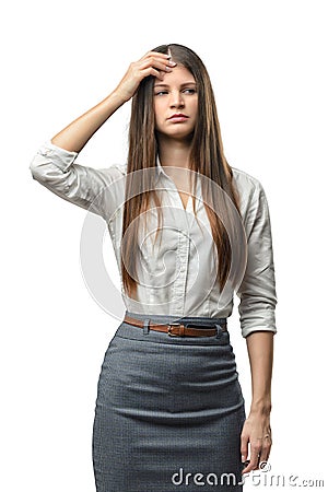 Cutout businesswoman stands touching her head by hand Stock Photo