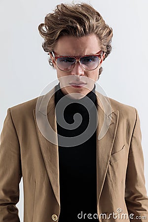 Cutout picture of cool man with blond long hair and sunglasses posing Stock Photo