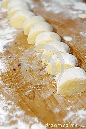 Cutted dough for dumplings Stock Photo