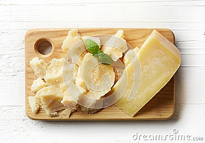 Cutting board of parmesan cheese Stock Photo