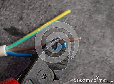 Cutting cable Stock Photo