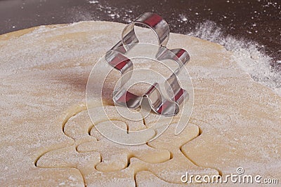 Cutting cookies dough gingerbread man Stock Photo