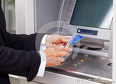 Cutting credit card Stock Photo
