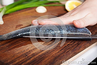 Cutting fish Stock Photo