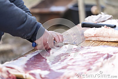 Cutting fresh meat Stock Photo