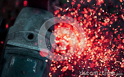 Cutting metal with disk grinder outdoors background Stock Photo