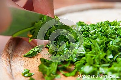 Cutting parsley Stock Photo