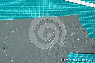Cutting pattern of pouch drawn on blank leather Stock Photo