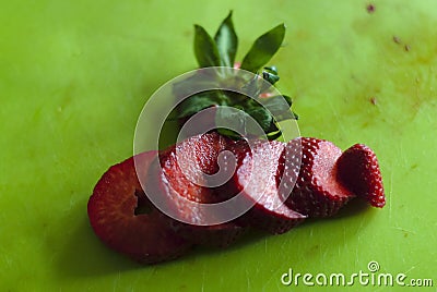 Cutting Strawberry with knife process 4 of 6 Stock Photo