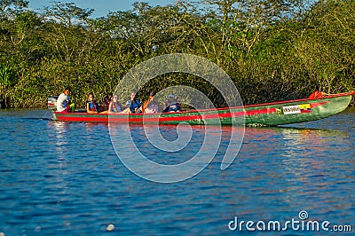 CUYABENO, ECUADOR - NOVEMBER 16, 2016: Unidentified people travelling by boat in Cuyabeno National Park, Ecuador Editorial Stock Photo