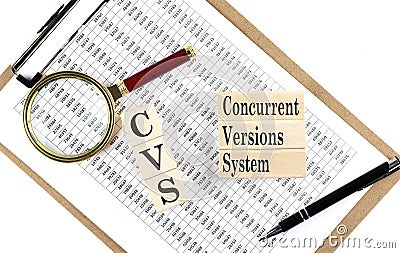 CVS - Concurrent Versions System text on wooden block on chart background Stock Photo