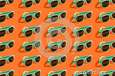Cyan, aqua menthe sunglasses pattern isolated on background of lush lava color. Stock Photo