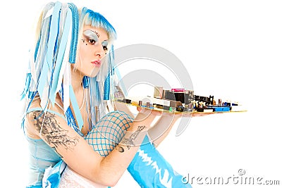 Cyber gothic girl holding mainboard in the hand. Stock Photo