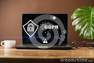 Cyber internet security concept. Blank screen laptop, sign general data protection regulation GDPR and shield with key icon Stock Photo