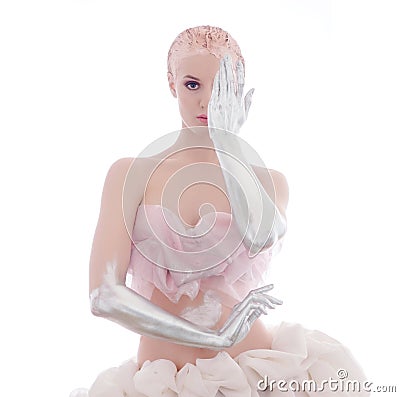 Cyber woman from the future with clay hairstyle, silver hands and skirt Stock Photo