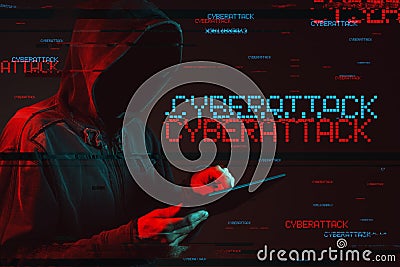 Cyberattack concept with faceless hooded male person Stock Photo