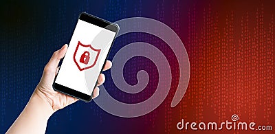 Cybercrime and hacker concepts. Hand-holding mobile or smartphone with red lock security and blue binary code background. Stolen Stock Photo