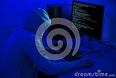 Cybercrime and Hacking Concept. Hacker Using Computer Virus Program Stock Photo