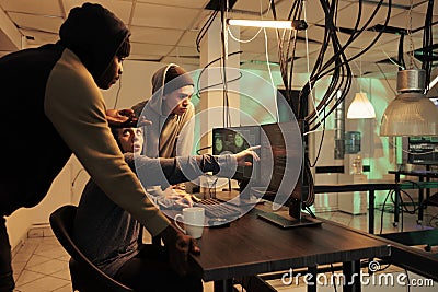 Cybersecurity specialists team fixing computer system cyberattack Stock Photo