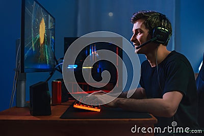 Cybersport pro gamer playing video game online Stock Photo