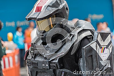 Cyborg in the pride parade with the motto `Proud together` on Christopher Street Day Editorial Stock Photo