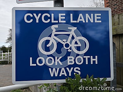 Cycle lane look both ways sign Stock Photo