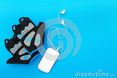 Cycling concept. Bicycle gloves and mp player Stock Photo