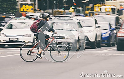 Cycling on city street blurry image Stock Photo