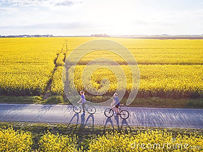 Cycling, group of young people with bicycles Stock Photo