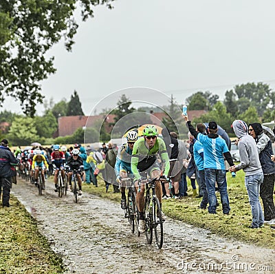 The Cyclist Bauke Mollema on a Cobbled Road - Tour de France 2014 Editorial Stock Photo