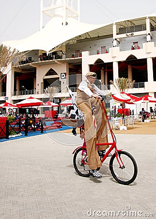 A Cyclist cycling at F1 village, 20 April 2012 Editorial Stock Photo