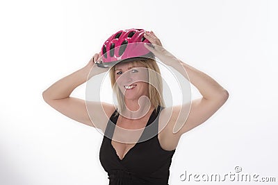 Cyclist holding safety helmet Stock Photo