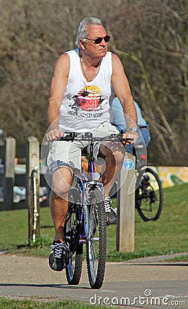 Cyclist on path Editorial Stock Photo