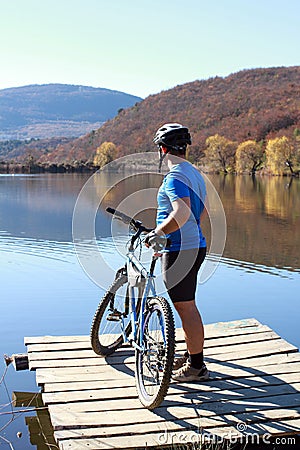 Cyclist on the top of a hill Stock Photo