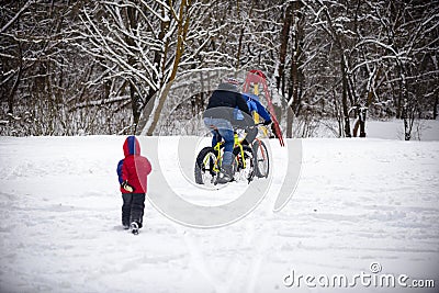 Cyclist in winter on a bicycle with very wide wheels 2018 Stock Photo