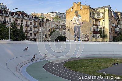 Cyclists on bike path against the backdrop of a quiet street landscape, Kyiv, Ukraine Editorial Stock Photo