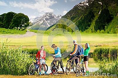 Cyclists biking outdoors Stock Photo