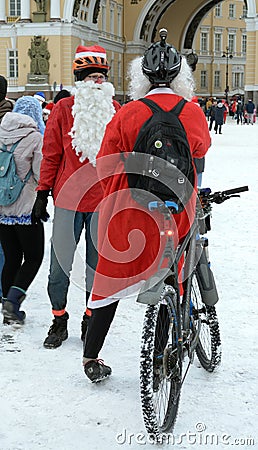 Cyclists in Christmas costumes. Editorial Stock Photo