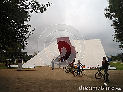 Cyclists at the entrance of the Ibirapuera Auditorium in Sao Paulo, Brazil Editorial Stock Photo