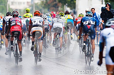 Cyclists from various teams cycle Editorial Stock Photo