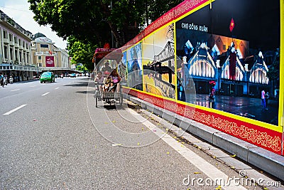 A cyclo driver is working on March 2, 2012 in Ho Chi Minh City, Vietnam. Cyclos have been around for more than a century, but they Editorial Stock Photo