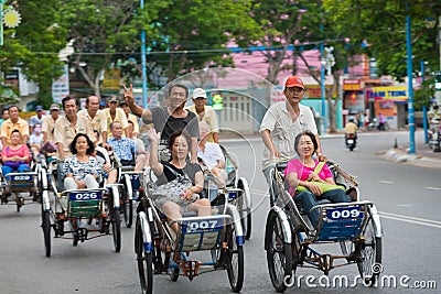 Cyclo drivers carry tourists Editorial Stock Photo