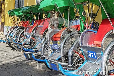 Cyclo serve tourists Editorial Stock Photo