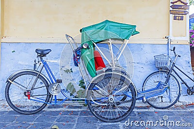 Cyclo serve tourists Editorial Stock Photo