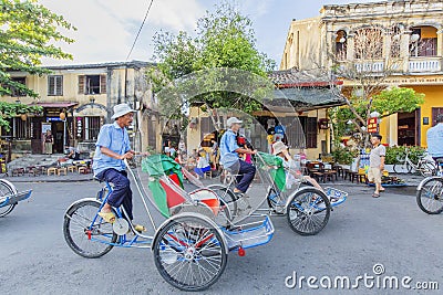 Cyclo serve tourists Editorial Stock Photo