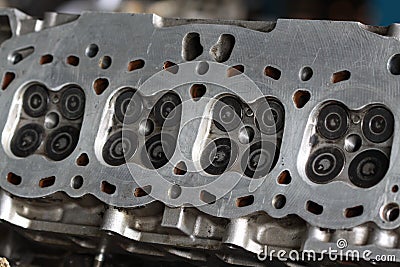 Cylinder head of the engine and damaged from industry work, removed cylinder head for inspect and replace intake and exhaust valve Stock Photo